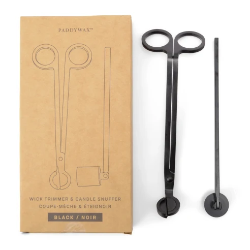 Set de regalo Paddywax con cortamechas y apagavelas negro mate junto a su caja de cartón kraft
