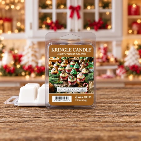 Wax melts Kringle Candle Kringle Cupcake 64 g sobre una mesa de madera rústica en un ambiente navideño de pastelería